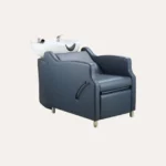 shampoo bowl chair Modern Amaré shampoo backwash unit featuring a tilting black ceramic bowl, sleek upholstered chair, and durable plumbing fixtures for professional hair washing.