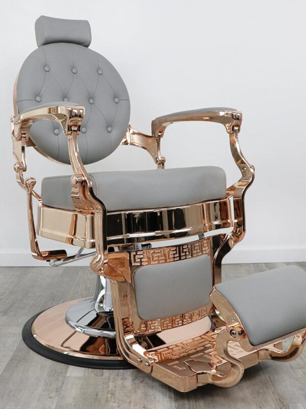 antique barber chairs​ Rose gold barber chair with white tufted vinyl upholstery, a polished rose gold metallic frame, and a heavy-duty hydraulic circular base.