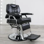 black barber chairs The Economic Barber Chair in black PVC vinyl with a heavy-duty steel frame, dual reclining mechanism, and 360-degree swivel base.
