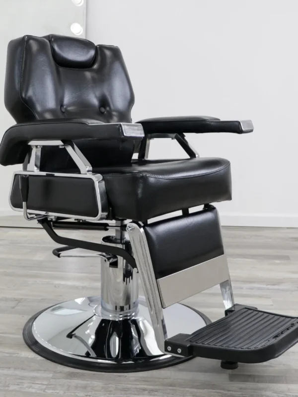 black barber chairs The Economic Barber Chair in black PVC vinyl with a heavy-duty steel frame, dual reclining mechanism, and 360-degree swivel base.