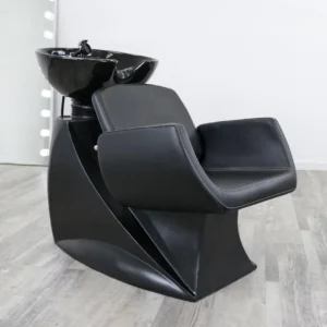 salon shampoo chair Denver shampoo backwash unit with a heavy-duty matte black fiberglass base, extra-wide black vinyl chair, and an adjustable tilting porcelain bowl.