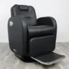 heavy duty barber chairs Modern Evander electric barber chair with dual-motor technology, high-density black PVC vinyl upholstery, and touch-button remote controls on a heavy-duty 500-lb capacity base.