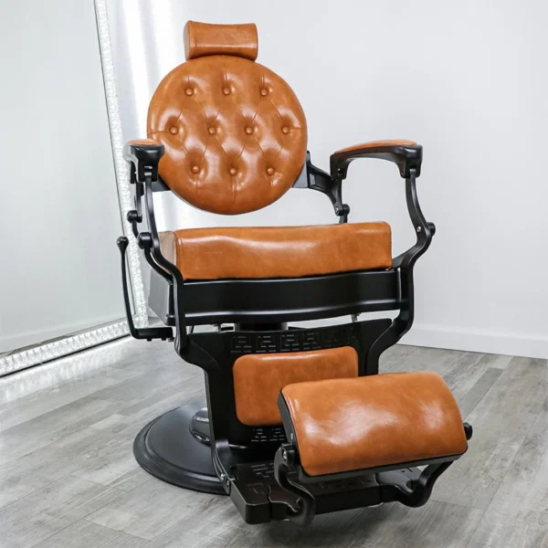 modern barber shop chairs Xavier barber chair featuring a professional cast iron NG1 pump, black steel base, and high-density plush cushions for heavy-duty barbershop use.
